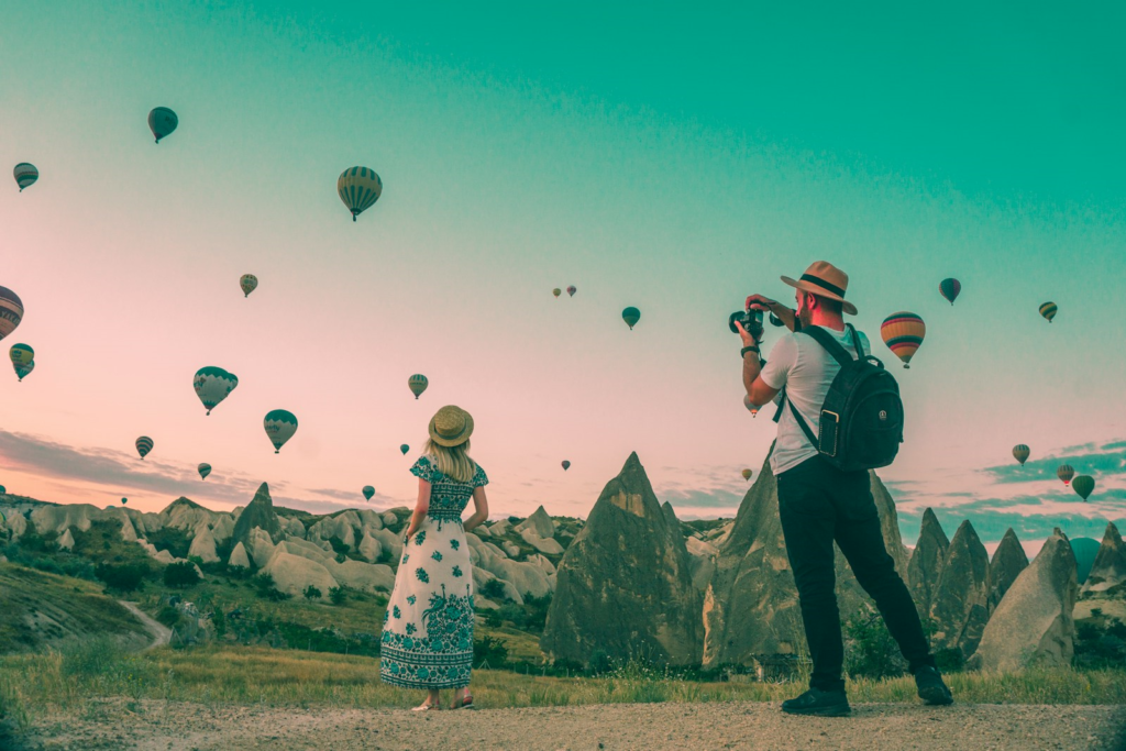 Partner capturing memories with a Carta Creations album